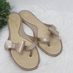 Melissa Glitter Jelly Bow Thong Sandals in Gold